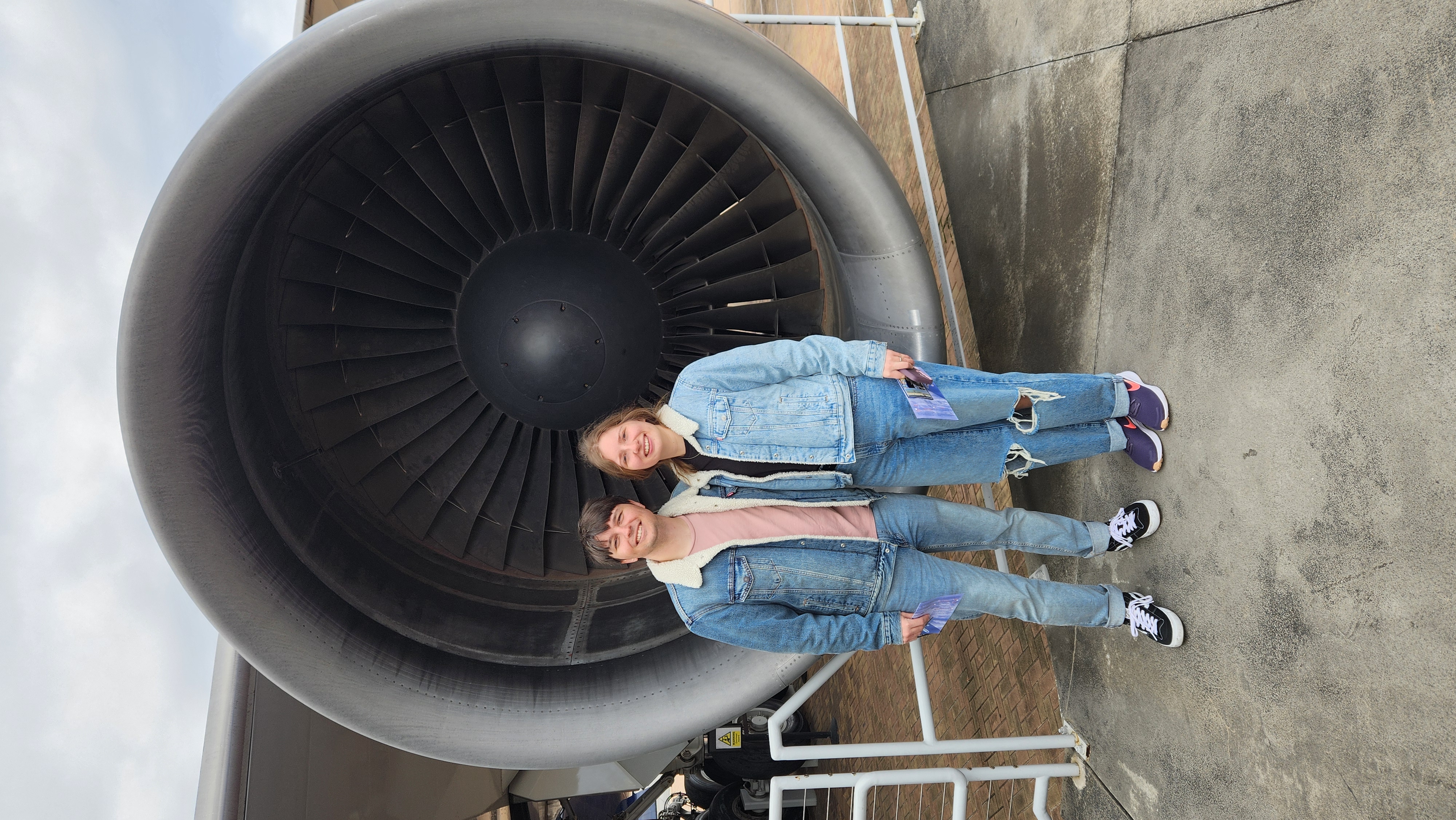 Jessica and FC exploring the Delta Museum of Flight in front of a Boeing 747.